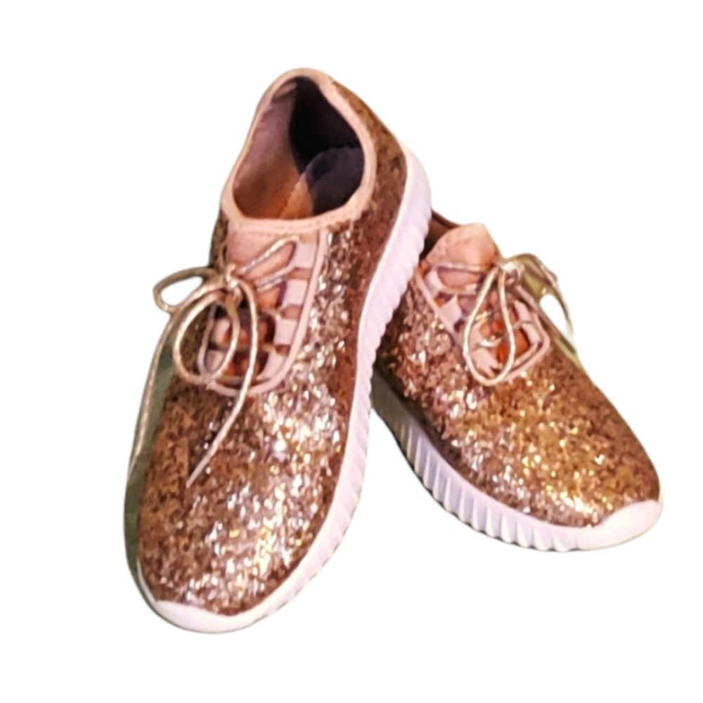 Rose Gold sparkle sneakers.